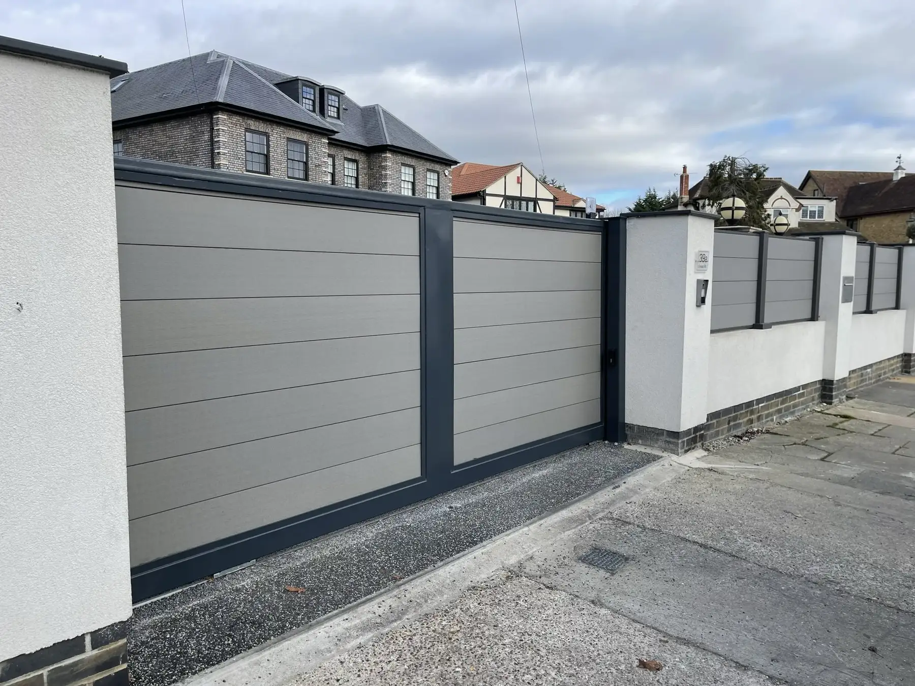 Remootio 3 smart gate opener installed on an automated gate system