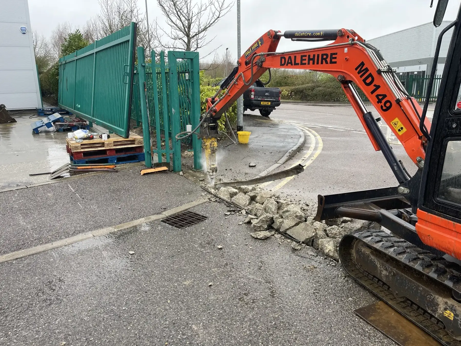Commercial sliding gate repair with excavator