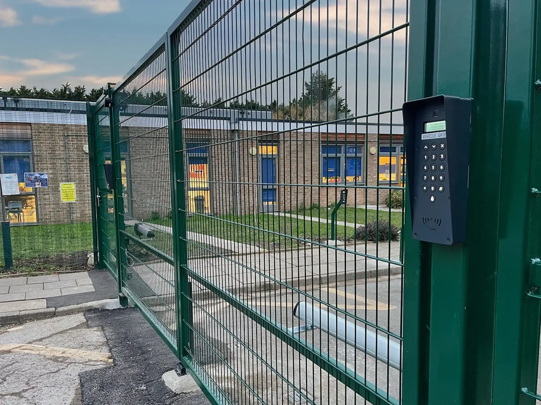 Electric school gate with access control panel